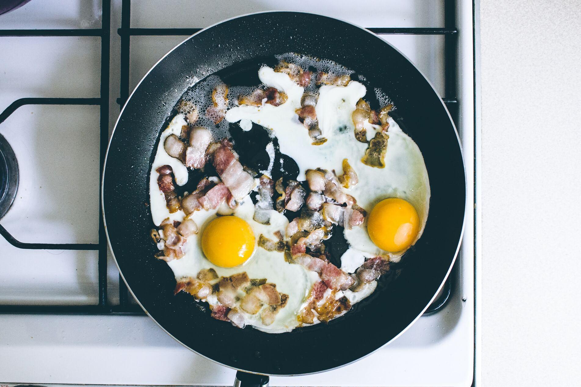 Heat butter in skillet. Pour in eggs. As eggs begin to set move spatula across bottom and side of skillet.